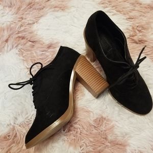 Black booties with tan soles